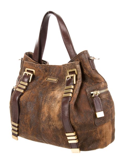 are michael kors handbags leather|Michael Kors distressed leather handbags.